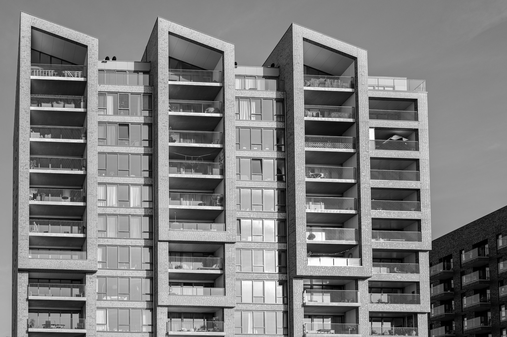 Modern apartment building with balconies and large windows